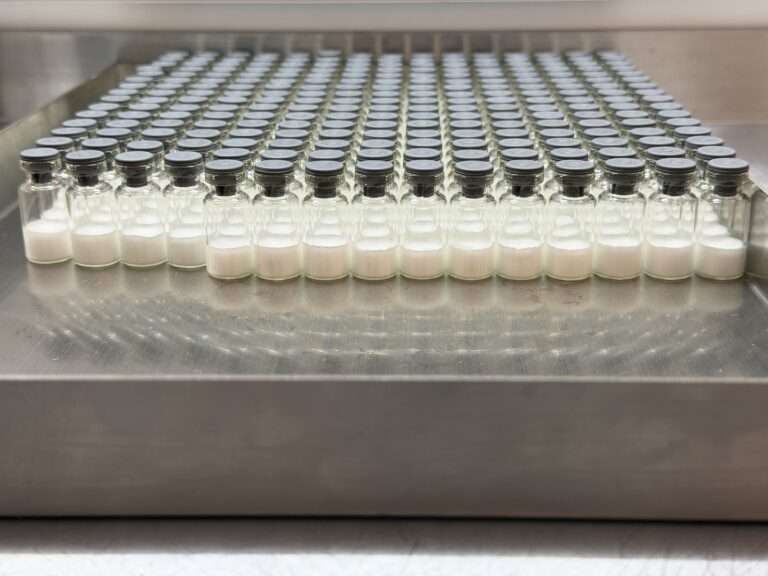 Rows of sealed glass vials on a laboratory tray – Contexx Research